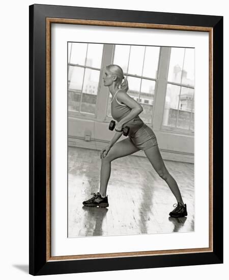 Young Woman Working Out with Hand Wieghts, USA-Chris Trotman-Framed Photographic Print