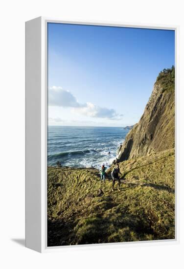 Young Women Hiking Along The Oregon Coast Trail. Oswald West State Park, OR-Justin Bailie-Framed Premier Image Canvas