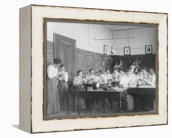 Young women studying static electricity in normal school Washington D.C., c.1899-Frances Benjamin Johnston-Framed Premier Image Canvas