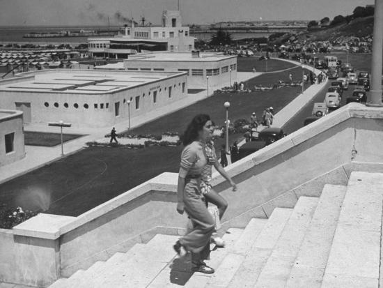 Young Women Walking Up Steps At The Beach Resort Mar Del Plata Young Women Walking Up Steps At The Beach Resort Mar Del Plata Premium Photographic Print By Hart Preston Art
