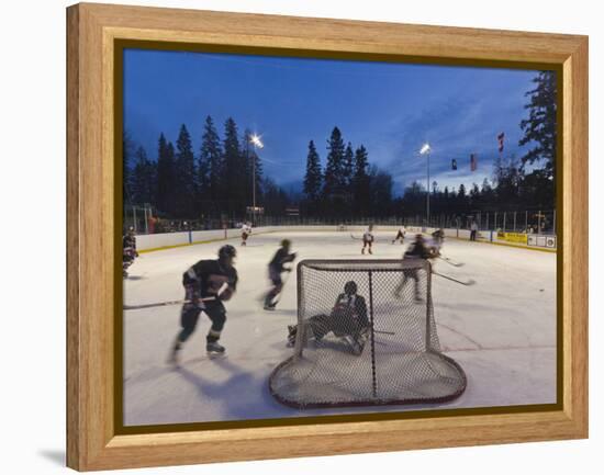 Youth Hockey Action at Woodland Park in Kalispell, Montana, USA-Chuck Haney-Framed Premier Image Canvas