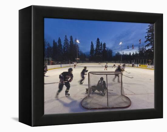 Youth Hockey Action at Woodland Park in Kalispell, Montana, USA-Chuck Haney-Framed Premier Image Canvas