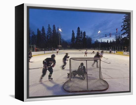 Youth Hockey Action at Woodland Park in Kalispell, Montana, USA-Chuck Haney-Framed Premier Image Canvas
