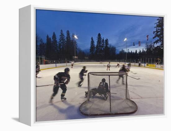 Youth Hockey Action at Woodland Park in Kalispell, Montana, USA-Chuck Haney-Framed Premier Image Canvas