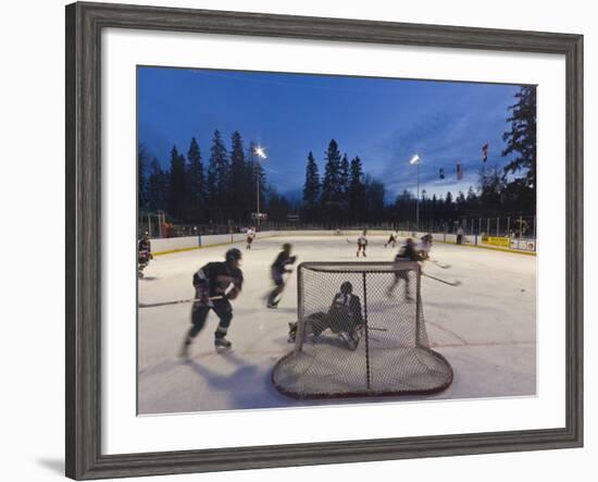 Youth Hockey Action at Woodland Park in Kalispell, Montana, USA-Chuck Haney-Framed Photographic Print