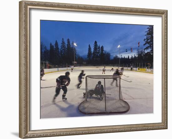 Youth Hockey Action at Woodland Park in Kalispell, Montana, USA-Chuck Haney-Framed Photographic Print