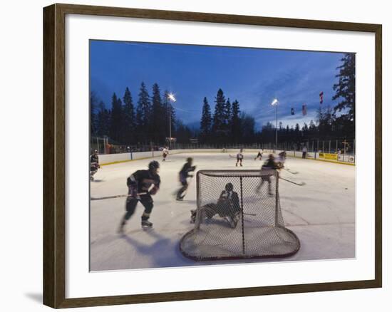 Youth Hockey Action at Woodland Park in Kalispell, Montana, USA-Chuck Haney-Framed Photographic Print