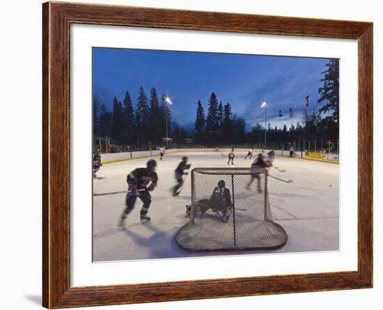 Youth Hockey Action at Woodland Park in Kalispell, Montana, USA-Chuck Haney-Framed Photographic Print