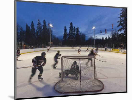 Youth Hockey Action at Woodland Park in Kalispell, Montana, USA-Chuck Haney-Mounted Photographic Print