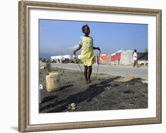 Youth Jumps Rope in a Camp for People Displaced by the Earthquake in Port-Au-Prince-null-Framed Photographic Print