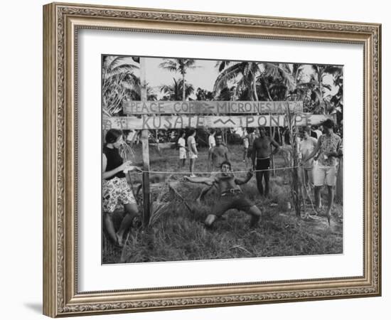 Youth of the Peace Corps Trainees Holding a Limbo Contest-null-Framed Photographic Print