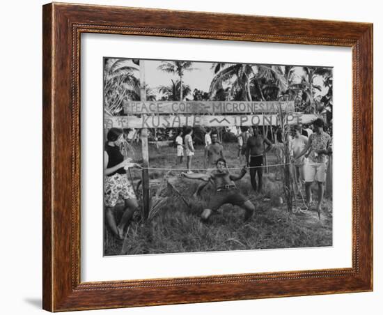 Youth of the Peace Corps Trainees Holding a Limbo Contest-null-Framed Photographic Print
