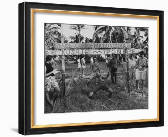 Youth of the Peace Corps Trainees Holding a Limbo Contest-null-Framed Photographic Print