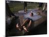 Youth Swims in a Water Reservoir as the Temperature Rises, on the Outskirts of Islamabad, Pakistan-null-Mounted Photographic Print
