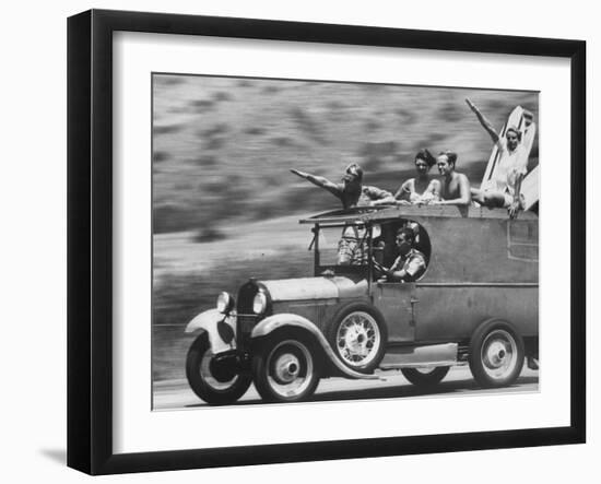 Youths Heading to the Beach to Surf-Allan Grant-Framed Photographic Print