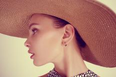 Portrait of Beautiful Girl in Hat in Profile, Posing in Studio-Yuliya Yafimik-Framed Photographic Print