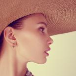 Portrait of Beautiful Girl in Hat in Profile, Posing in Studio-Yuliya Yafimik-Framed Photographic Print