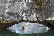 Ha Long Bay, Vietnam. View of kayaker through limestone arch.-Yvette Cardozo-Photographic Print