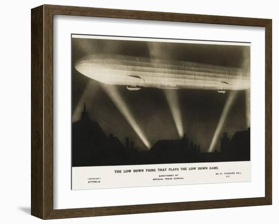 Zeppelin Illuminated by Searchlights-null-Framed Photographic Print