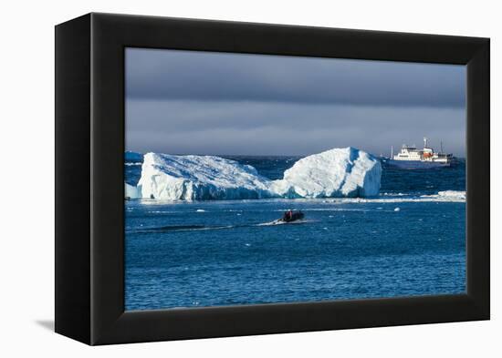 Zodiac cruising back to a cruise ship anchoring behind an iceberg, Brown Bluff, Antarctica, Polar R-Michael Runkel-Framed Premier Image Canvas