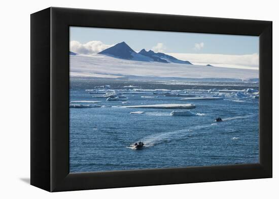 Zodiac with tourists cruising through the icebergs, Brown Bluff, Tabarin Peninsula, Antarctica, Pol-Michael Runkel-Framed Premier Image Canvas