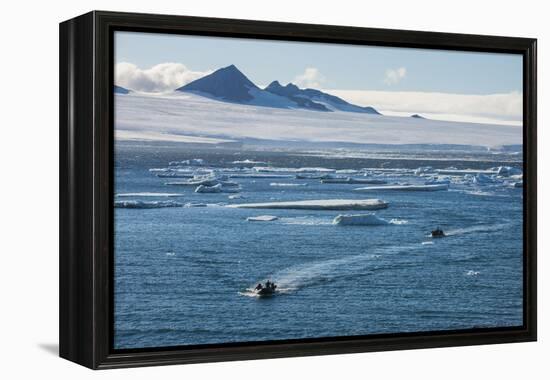 Zodiac with tourists cruising through the icebergs, Brown Bluff, Tabarin Peninsula, Antarctica, Pol-Michael Runkel-Framed Premier Image Canvas