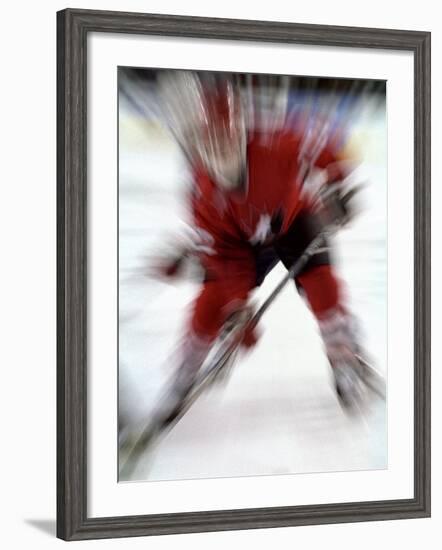 Zoom Explosion View of Ice Hockey Player-Paul Sutton-Framed Photographic Print