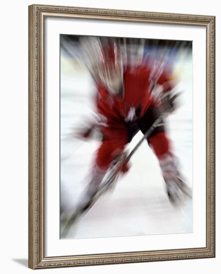 Zoom Explosion View of Ice Hockey Player-Paul Sutton-Framed Photographic Print