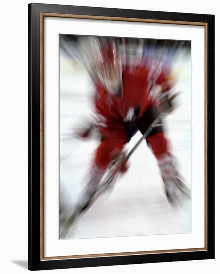 Zoom Explosion View of Ice Hockey Player-Paul Sutton-Framed Photographic Print