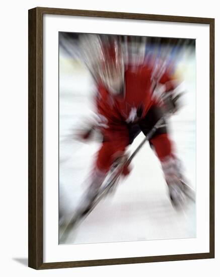 Zoom Explosion View of Ice Hockey Player-Paul Sutton-Framed Photographic Print