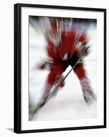 Zoom Explosion View of Ice Hockey Player-Paul Sutton-Framed Photographic Print